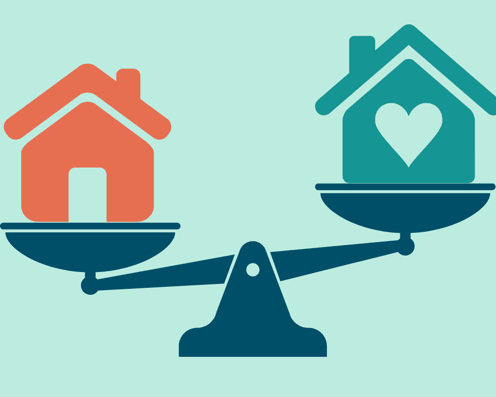 Scale with a house on one aide and a different colout house on the other with the scales tipped that one house is higher than the other